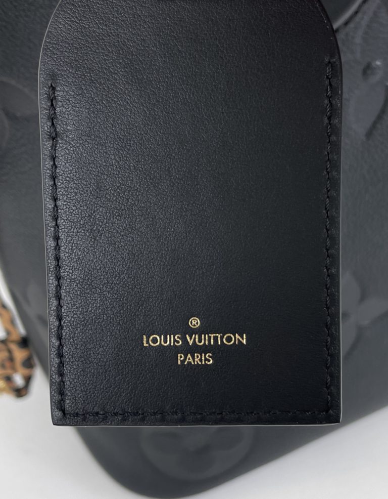 Louis Vuitton Wild at Heart Pochette Melanie MM - A World Of Goods