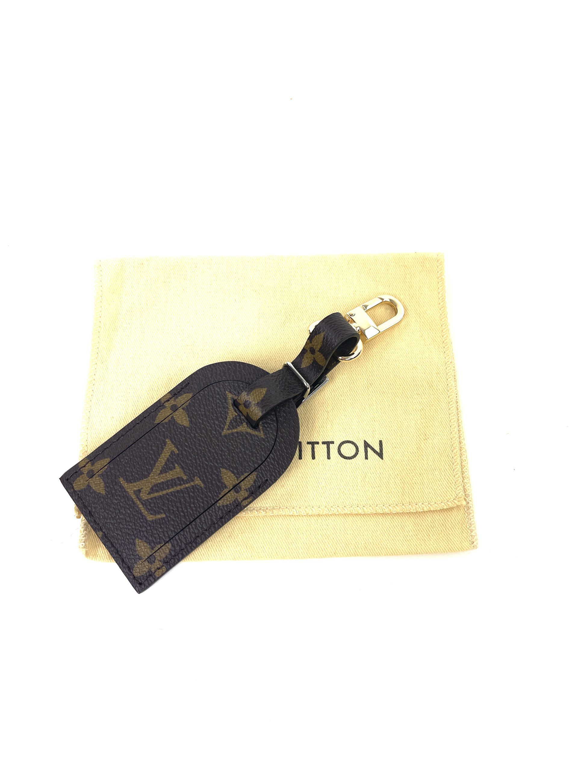 luggage tag louis vuittons