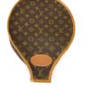 Front of the cover with the oval leather patch at the handle