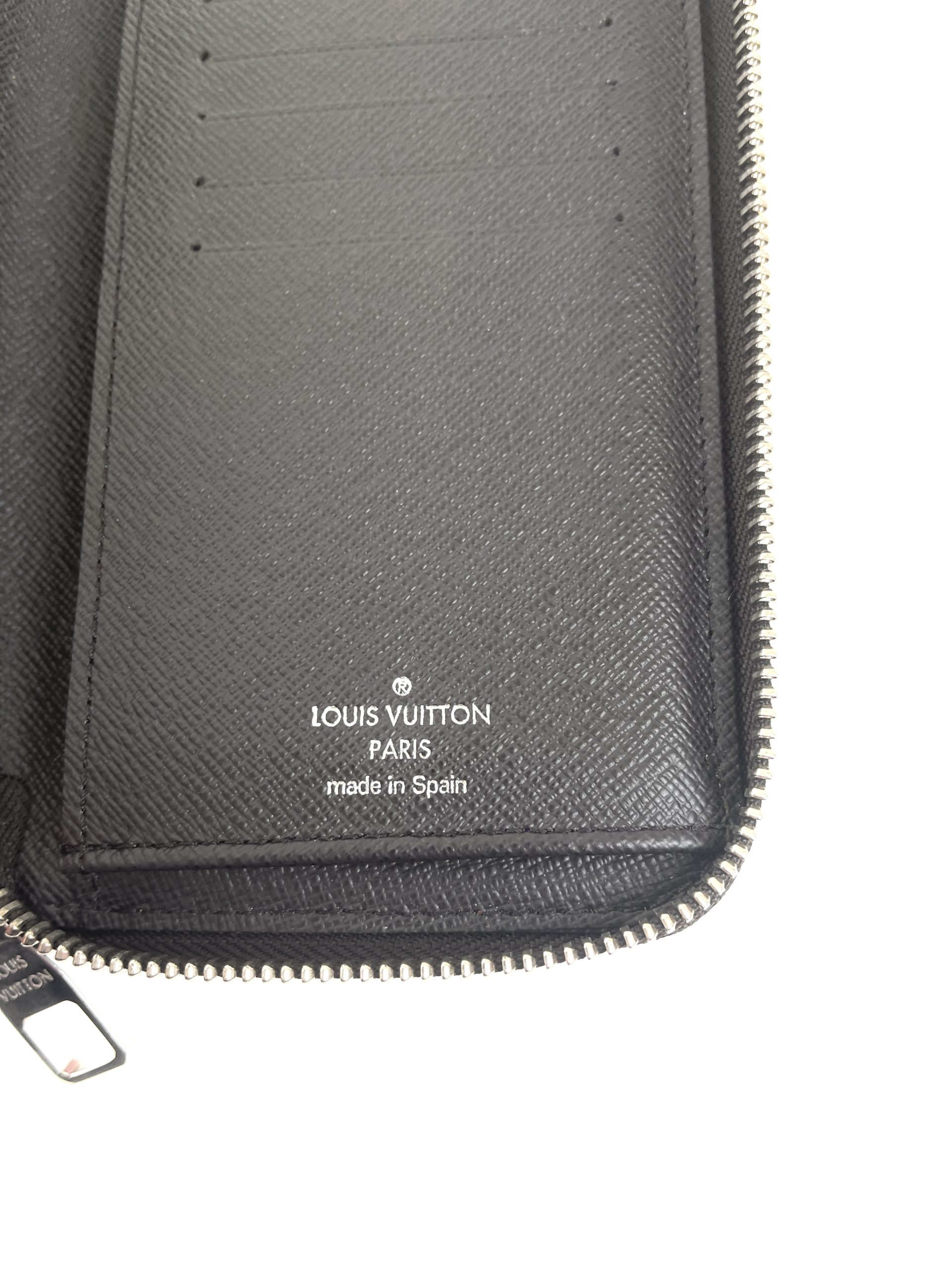 Louis Vuitton Ebene Vertical Zippy Wallet - A World Of Goods For