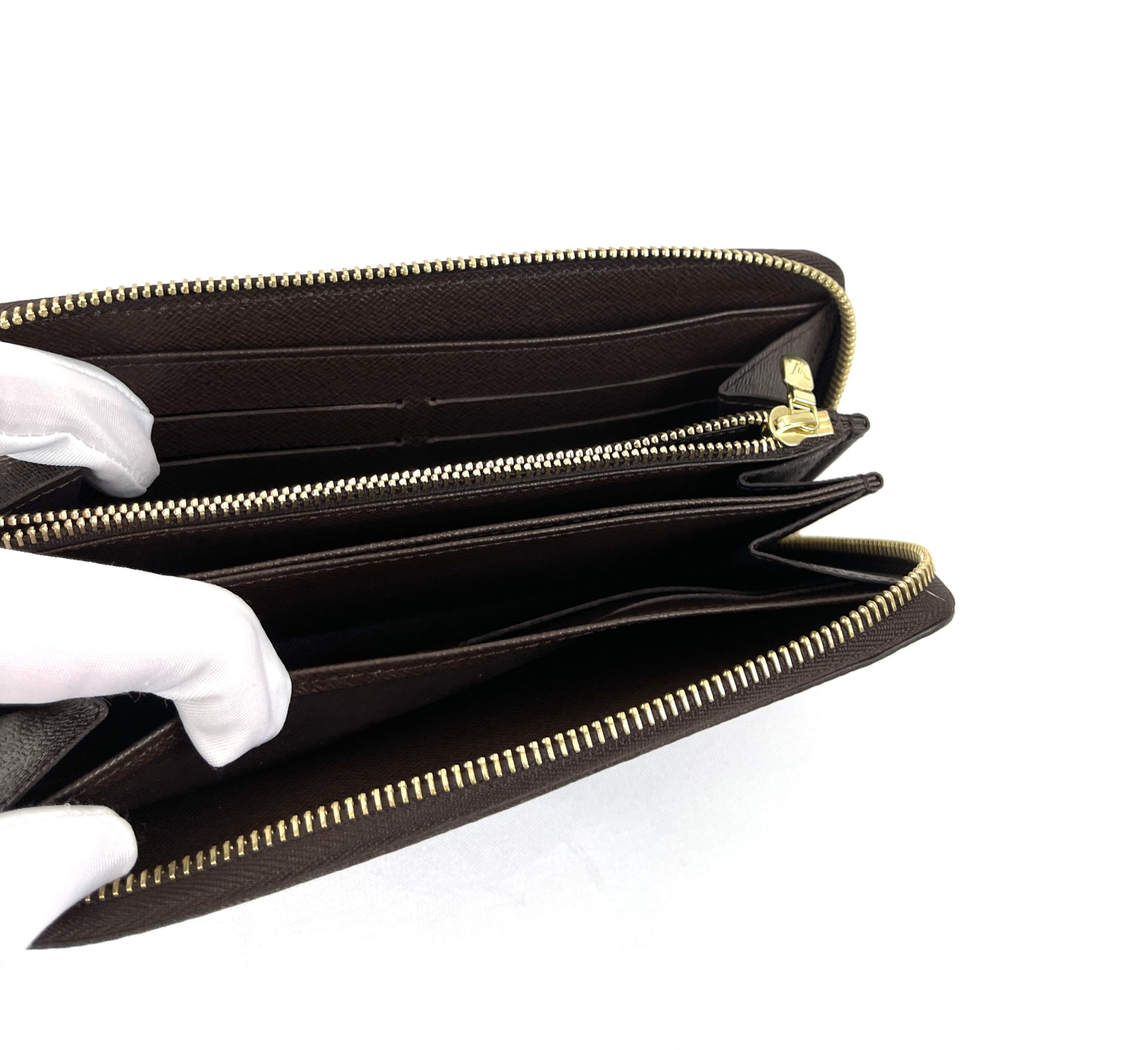 Louis Vuitton Zippy Wallet Pompon Pivone - A World Of Goods For
