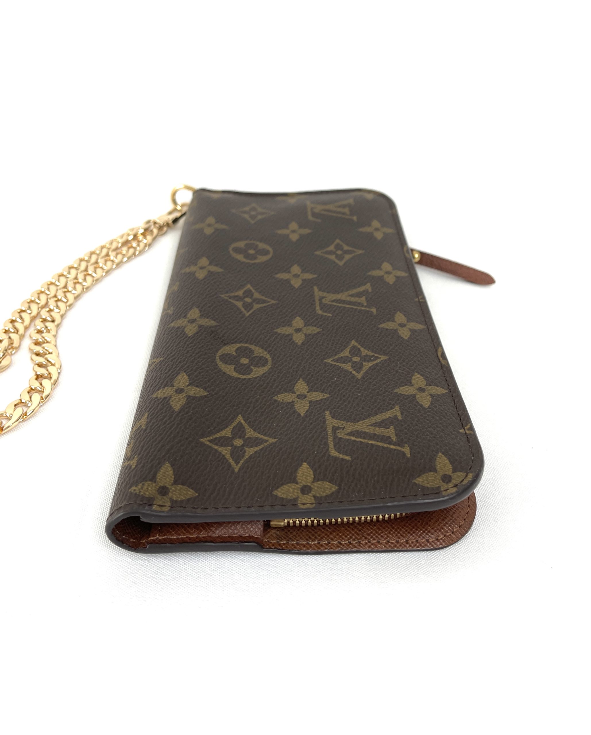I kove the Louis Vuitton Insolite wallet. It has 12 credit card slots