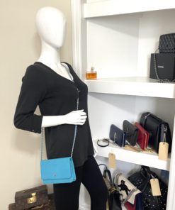 Chanel Turquoise Lizard Embossed Leather WOC with Silver Hardware mannequin