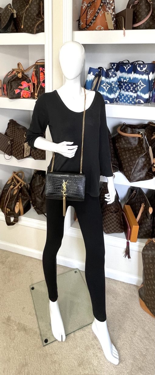 YSL Saint Laurent Small Kate Crocodile-Embossed Black Leather Shoulder Bag With Gold Tassel with mannequin