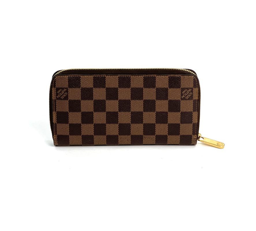 Zippy cloth wallet Louis Vuitton Brown in Cloth - 28330350