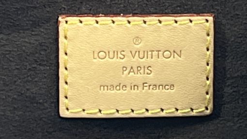 Louis Vuitton Pochette Metis Monogram tag