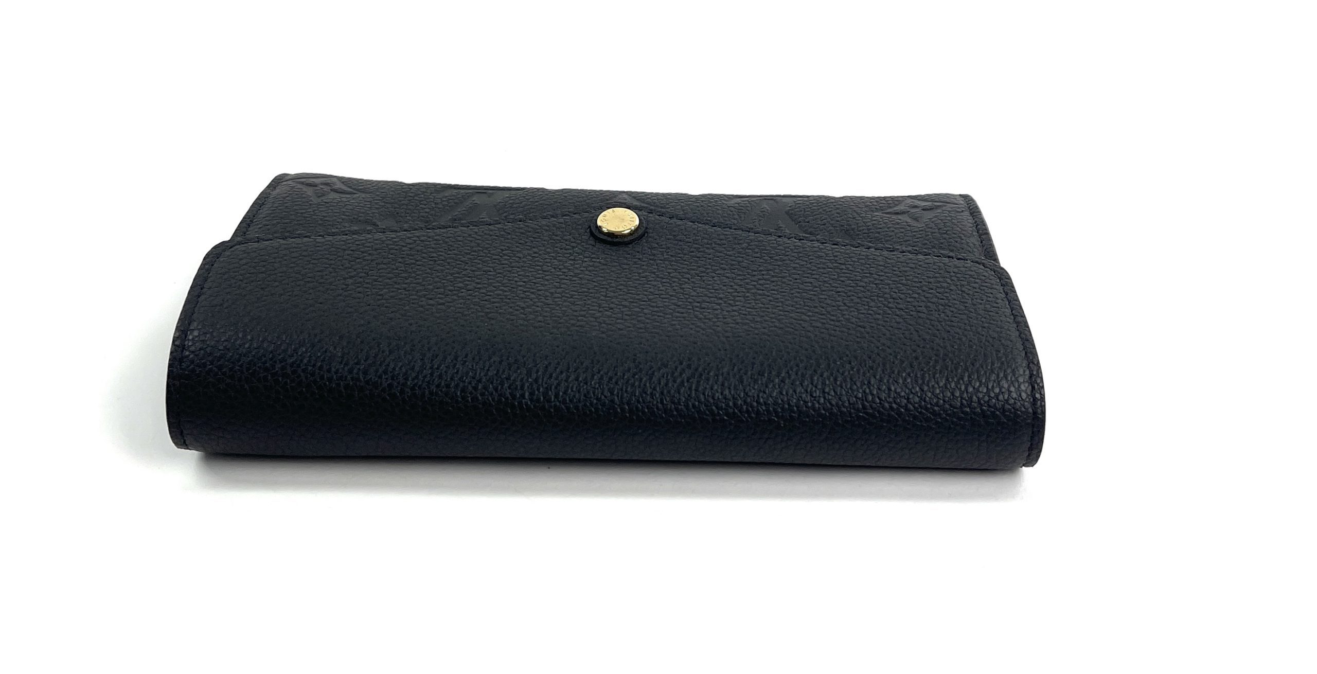 Louis Vuitton, a black embossed leather 'Sarah' wallet, 2015