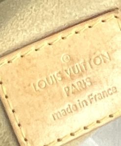 Louis Vuitton Monogram Artsy MM Hobo tag