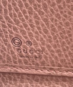 Gucci GG Canvas Zip Around Wallet with Soft Pink Trim logo