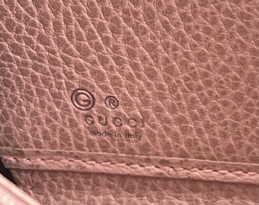 Gucci GG Canvas Zip Around Wallet with Soft Pink Trim logo