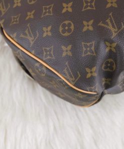Sold at Auction: Louis Vuitton, LOUIS VUITTON KALAHARI Hobo bag