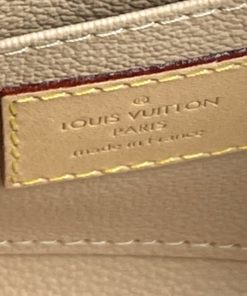 Louis Vuitton Toiletry 19 Monogram Cosmetic Bag tag