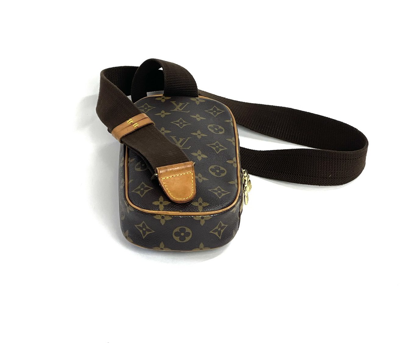 LOUIS VUITTON Brown Monogram Coated Canvas and Vachetta Leather Pochette  Gange at 1stDibs  vintage louis vuitton fanny pack, louis vuitton gange  crossbody, louis vuitton monogram canvas pochette gange