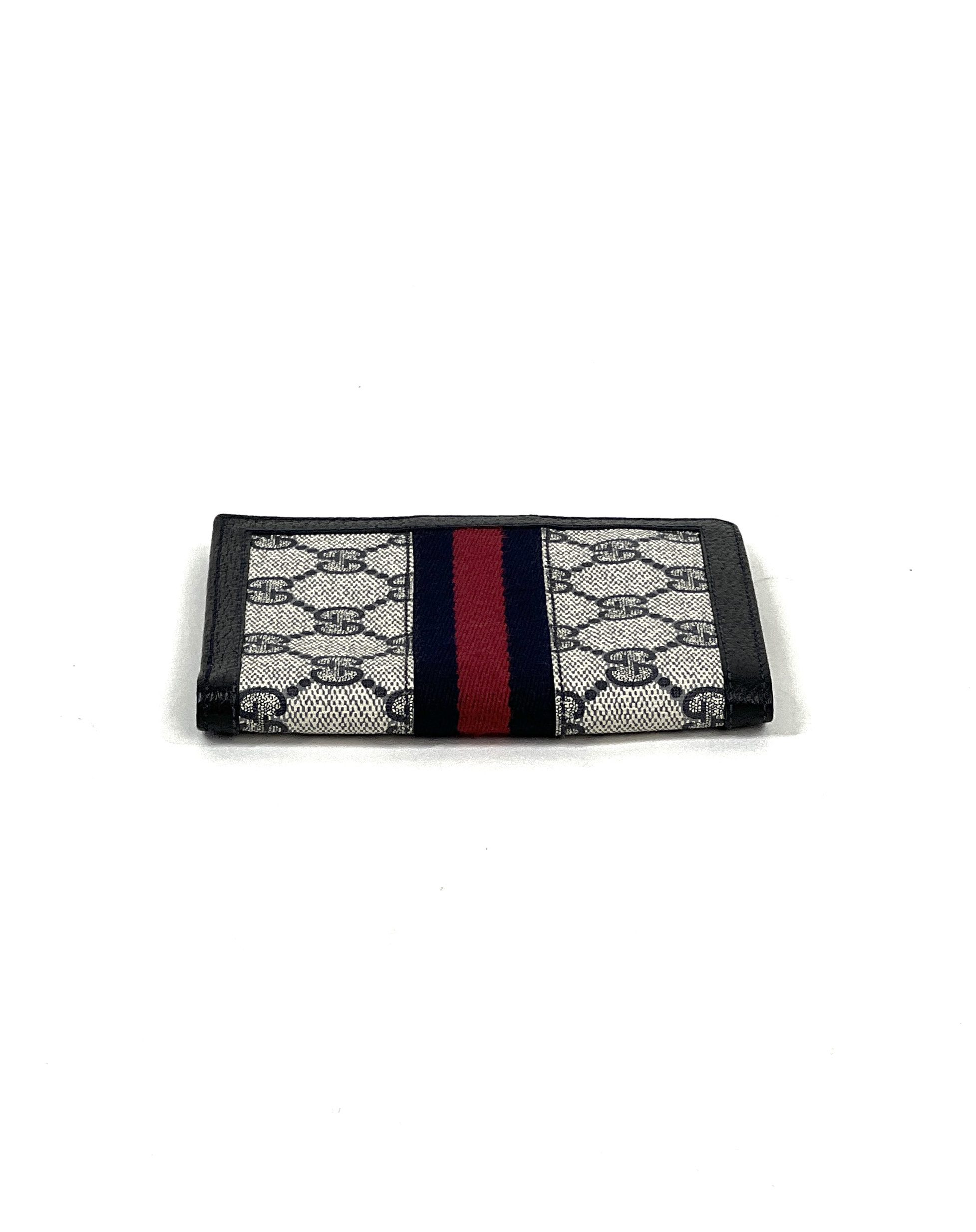 GUCCI: wallet in GG Supreme fabric with monogram - Black
