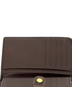 CLEARANCE SALE ‼️ AuthenticLouis Vuitton short kisslock wallet in Damier  Ebene in 2023
