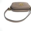 Front of the bag with the strap looped in front
