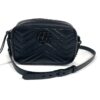 Front of the bag with the strap looped to one side