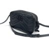 Front view with the strap coiled behind the bag