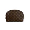 Side view showing the domed shape and gold zip pull