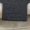 embossed leather tab on the natural linen lining