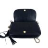 the flap open showing the two gold snap studs