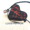 Bag shown with its Louis Vuitton dust bag