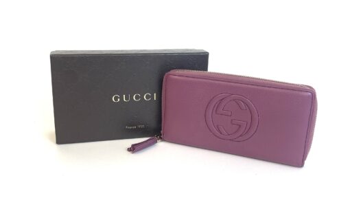 Gucci Soho Mauve leather zippy wallet with tassel