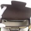 flap open showing the natural canvas lining and interior stamp