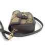 three quarter view with the leather strap to the side