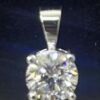 Close up of the round brilliant in its four prong setting