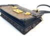 Angled top view of the trunk lock and corners