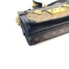 Top of the clutch showing the gold trunk hardware