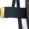 Strap attachment with the gold hardware plate