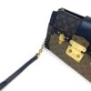 Angled view showing the lock and chain strap