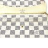 Wallet opened flat showing the card slots and bill compartment