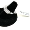 Ring on the velvet stand with the retail tag attached