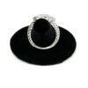 Ring on the velvet stand showing the cable band