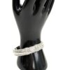 Bangle worn on the display hand from the front