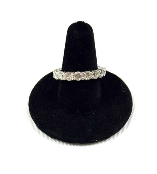 Natural diamond eternity band consisting of 5.22 carats of natural round brilliant cut diamonds