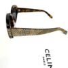 Side view with the Celine Paris box behind
