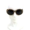 Sunglasses shown front on a white display head