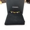 Hair clip in its black Chanel presentation box