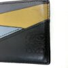Close up of the mustard and blue panels meeting