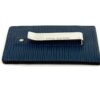 Case laid flat showing the money clip across the back