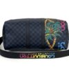 Side view with the strap running the length of the bag