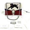 Bag shown with its Gucci booklets and care cards