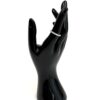 Band worn on the finger of a black display hand