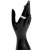 Band worn on the finger of a black display hand