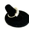 Ring tilted to show the shared prong setting