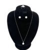 Necklace, studs and ring shown together on the bust